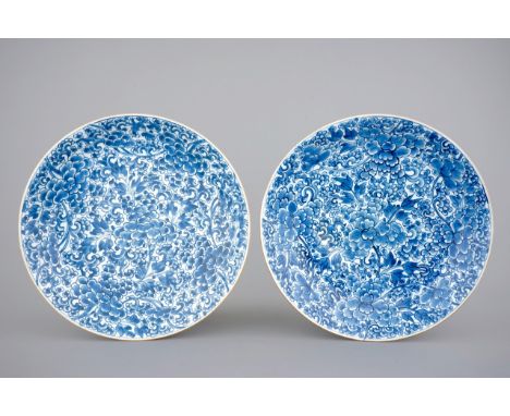 A pair of blue and white Chinese porcelain peony scroll dishes, Kangxi, 18th C. Dia.: 38,5cm Condition reports and high resol