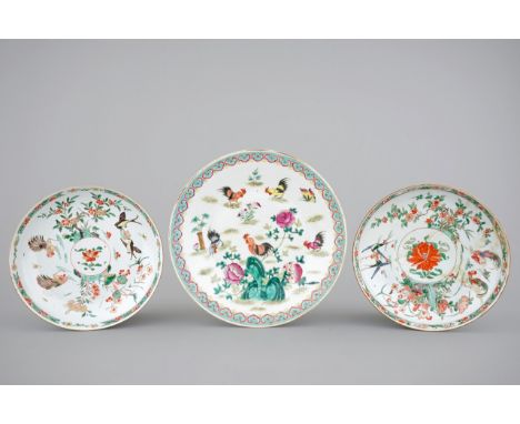 Three Chinese porcelain dishes with cockerels, Kangxi famille verte and 19th C. famille rose Dia.: 34,5 cm (the famille rose 