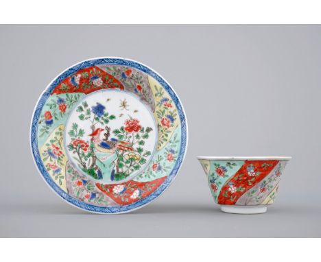 A Chinese famille verte porcelaine moulded cup and saucer, Kangxi, ca. 1700 Cup: H.: 4,5 - Dia.: 8 cm  Saucer: 13,5 cm     Pr