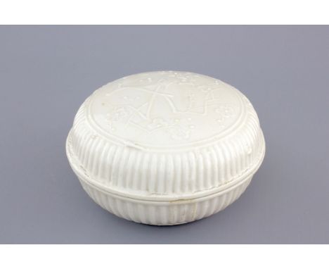A round Chinese Dehua blanc de Chine box and cover, Kangxi, ca. 1700 H.: 7,2 cm Dia.:   14,5 cm     The cover decorated with 