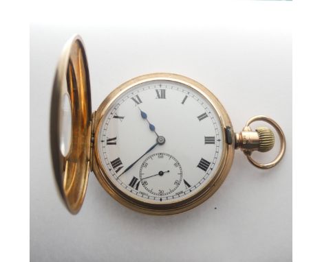 A 9ct gold Half Hunter Pocket Watch, the white enamel dial with Arabic Numerals and subsidiary second dial, Swiss 15-jewels m