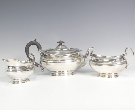 A George V silver three piece Tea Set, by&nbsp;Goldsmiths &amp; Silversmiths Co Ltd., hallmarked Sheffield 1922 and 1926, of 