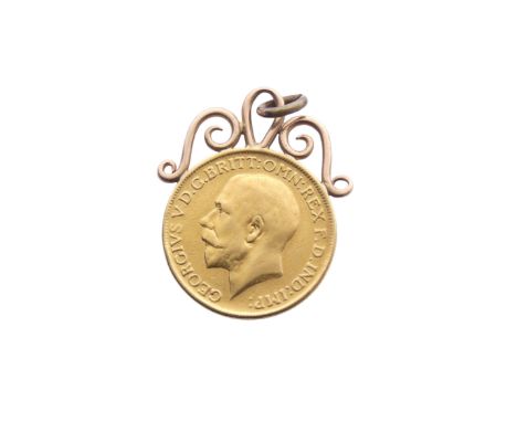 A George V gold Sovereign, dated 1914, on soldered pendant mount and metal suspension ring, gross total weight 9g. 