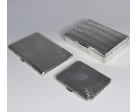 A George VI silver cigarette case, hallmarked Chester, 1941, with engine turned decoration and internal inscription dated 194