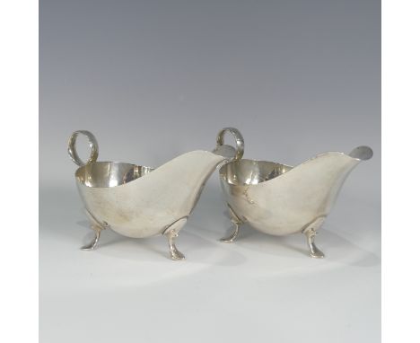 A pair of George VI silver Sauce Boats,&nbsp;by&nbsp;James Dixon &amp; Sons Ltd, hallmarked Sheffield, 1943, of plain traditi