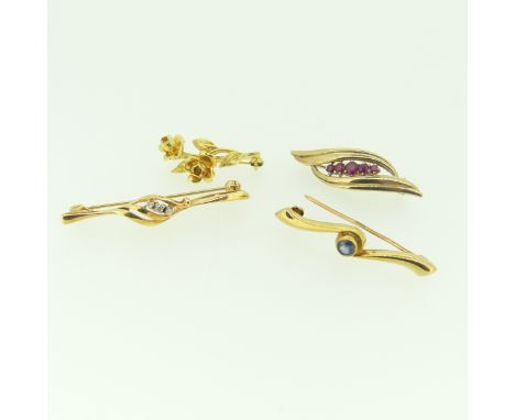 A small 9ct gold foliate Brooch, 2.5cm long, together with a 9ct gold bar brooch set sapphire centre, a ruby five stone brooc