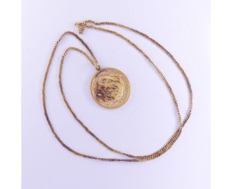 A Chinese circular gold Pendant Medallion,&nbsp;the front with dragon chasing the pearl, the reverse with character marks, 3.