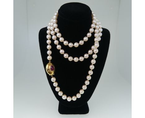 A string of uniform Cultured Pearls, approx. 7.5mm diameter, 107 pearls in total, individually knotted, with an unmarked yell