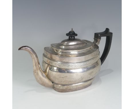 A George III silver Teapot, by&nbsp;Solomon Hougham, hallmarked London 1804, of ovoid form with bands of bright cut decoratio