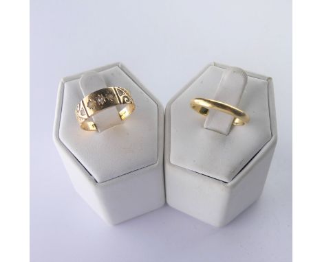 An antique 15ct gold Ring, set seed pearls with diamond point centre, Size O, 2.8g, together with and 18ct gold band, Size N,