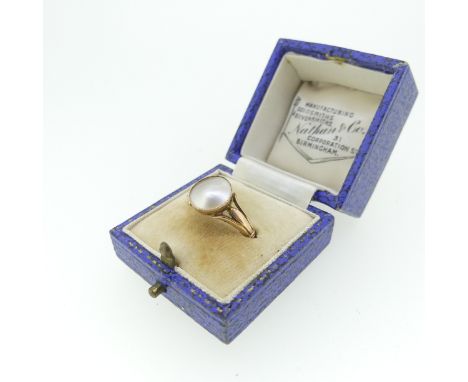 An early 20thC mabe Pearl Ring, millegrain set in 9ct rose gold, Size P, approx total weight 2.6g. 