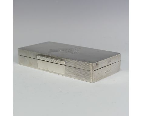 A George VI silver Cigarette Box, by&nbsp;A Wilcox, hallmarked Birmingham, 1950, of hinged rectangular form with engine turne