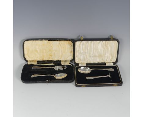 A cased George V silver Spoon and Pusher, the spoon Birmingham 1935, pusher Sheffield, 1922, together with a silver fork and 