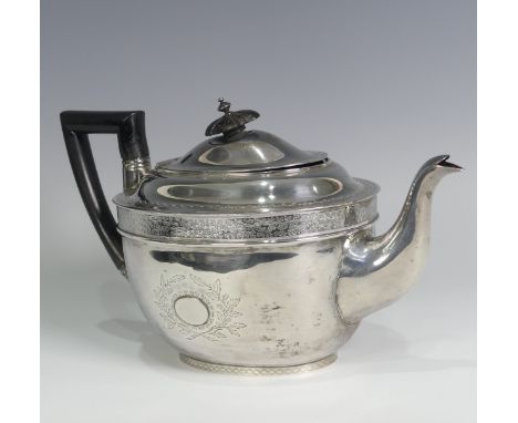 A George III silver Teapot, hallmarked London, 1805, of oval form with bright cut decoration, wooden handle and finial, 16cm 