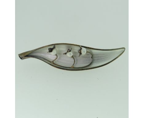 A Norwegian silver gilt and enamel Lilly Brooch,&nbsp;by&nbsp;Arne Nordlie, 8.3cm long. 