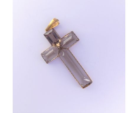 A large smoky quartz Cross Pendant, with four facetted quartz stones claw set in unmarked yellow gold, tested, within a pierc