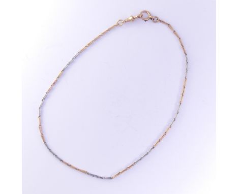 An 18ct gold Necklace, formed of three alternate white and yellow links, with clip fitting marked 18, and damaged bolt ring, 