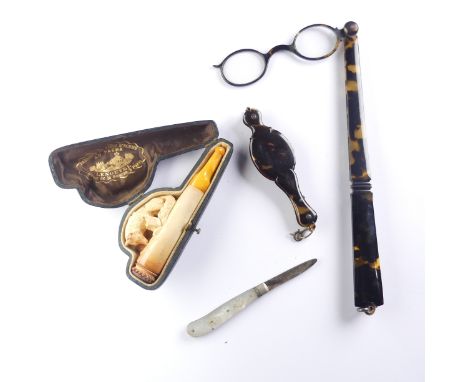 A cased amber mounted Meerschaum Pipe, depicting a fox, together with a pair of tortoiseshell lorgnettes, another pair damage