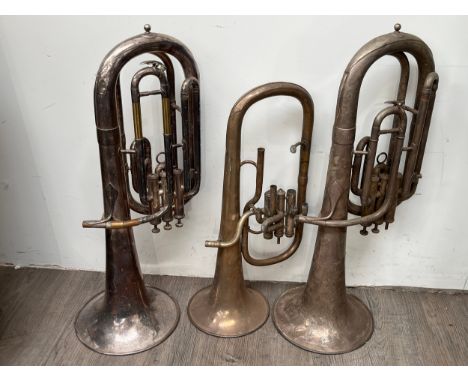 Three brass instruments including a Baritone horn 