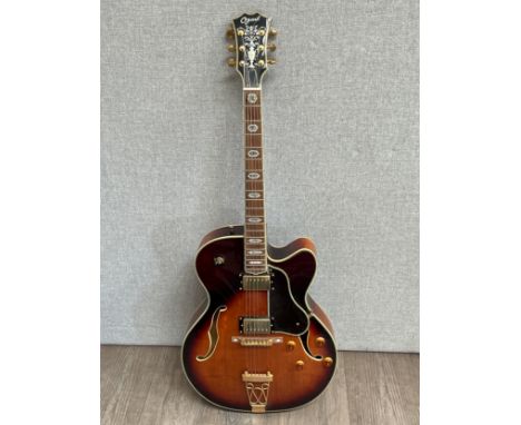 An Ozark 'Professional' semi-acoustic guitar, sunburst body, Ozark hard case