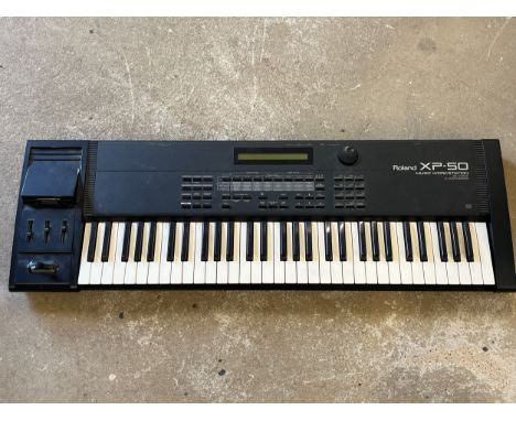 A Roland XP-50 music workstation keyboard 