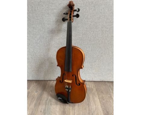 An early 20th Century E.R. Schmidt &amp; Co. Stradivarius style full size (4/4) violin, two piece maple back, cased