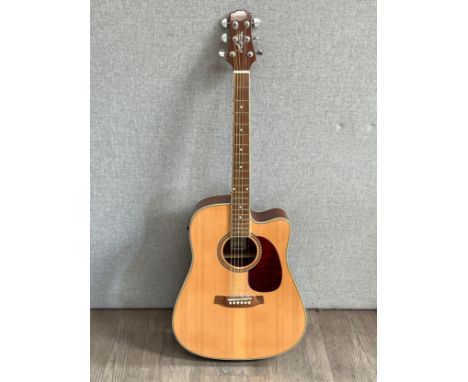 An Ashton SPD25CEQ NT electro acoustic guitar, single cutaway