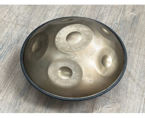 A 'hand pan' drum, soft cased