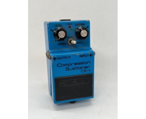 A 1980's Boss CS-1 Compression Sustainer guitar effects pedal, Made in Japan, black label