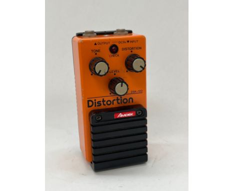 An Amdek Distortion DSK-100 guitar effects pedal, made in Japan