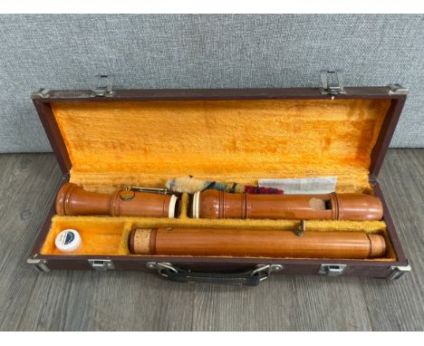 A Zen-On wooden tenor recorder circa 1980, with case. With original receipt from Bergman B.V, Arnhem, Netherlands
