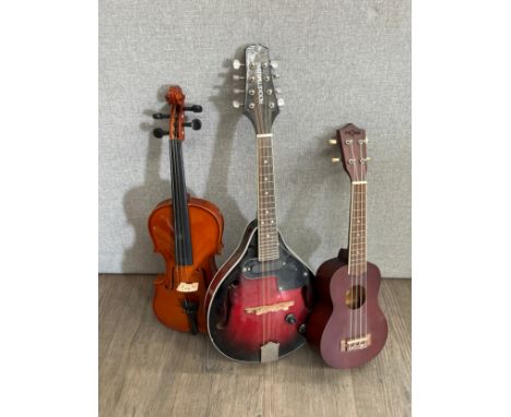 An Antoni student’s violin, a Rocketmusic mandolin and a Fzone ukulele (3)