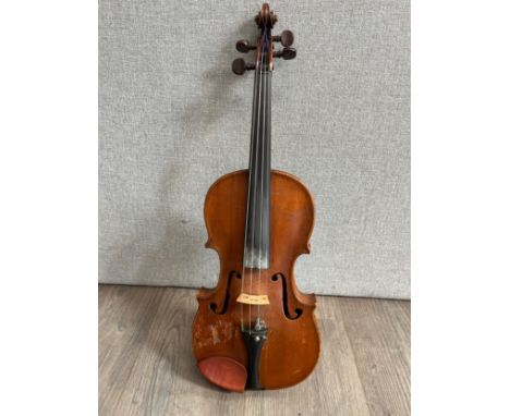 An early 20th Century full size (4/4) violin, no maker, single piece figured back, split to top, hard cased
