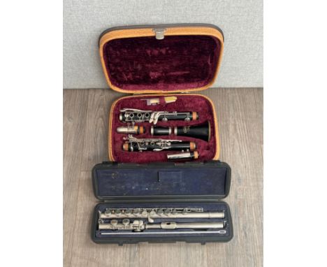 A Hernals flute model S100, cased, together with a Corton clarinet, cased (2)