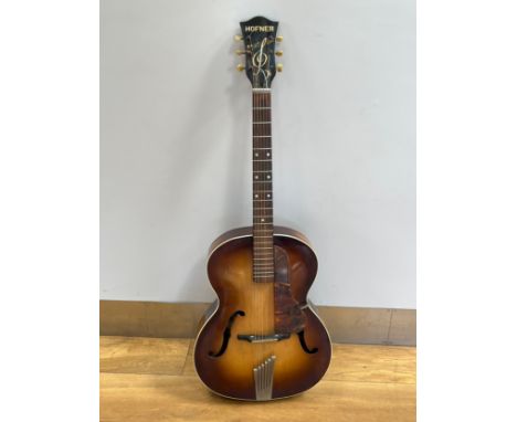 A Hofner Congress acoustic guitar circa 1965, sunburst body, tortoiseshell effect pickguard, Brazilian rosewood fingerboard. 