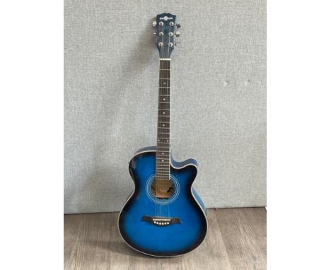 A Gear4Music electro acoustic guitar with single cutaway, blue burst body