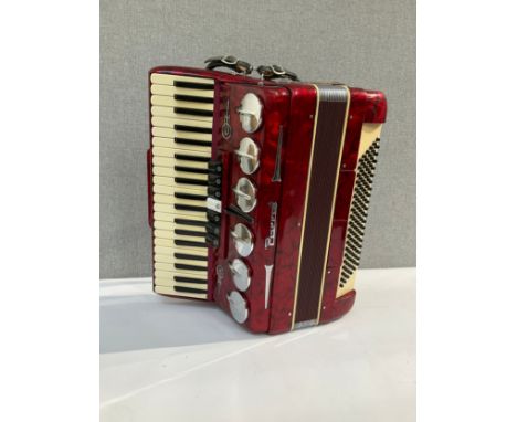 A Parrot 120 bass piano accordion, red pearlescent case, cased