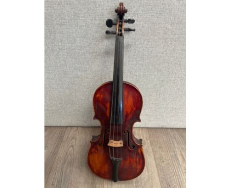 A 19th Century Stradivarius style violin, in 7/8 size, with provenance relating to its use in the 1920's at the Metropolitan 