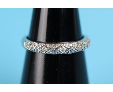 White gold diamond set ring