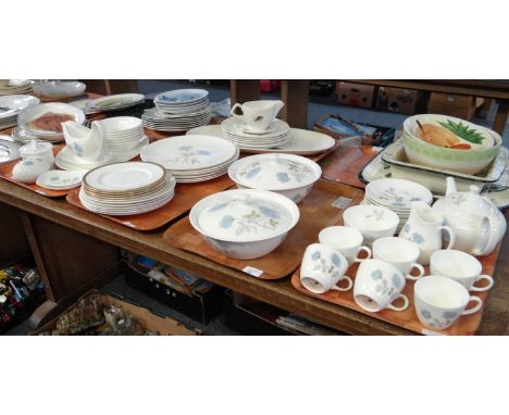 Four trays of mostly Wedgwood 'Ice Rose' design bone china to include: plates, bowls, sauceboat on stand, lidded tureens, 18 