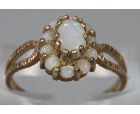 9ct gold opal cluster dress ring.  Size K1/2.  1.8g approx.  (B.P. 21% + VAT) 