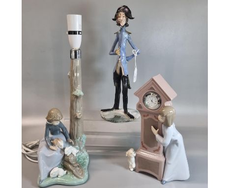 Nao Spanish porcelain table lamp decorated with young girl, rabbits and a tree stump together with another Nao Spanish porcel