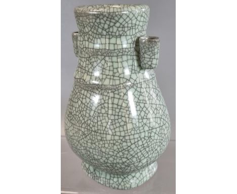Chinese stoneware 'Hu' form arrow vase, covered all over in a thick 'Ge' type celadon glaze with black stained crackles, two 