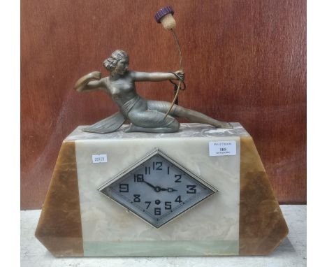 Art Deco design marble geometric mantle clock with female archer figure and diamond shaped silvered face.  Overall 37cm high 