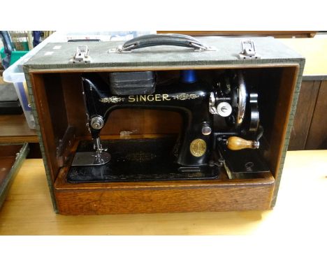 Vintage Singer sewing machine in a simulated crocodile skin case.  (B.P. 21% + VAT) 