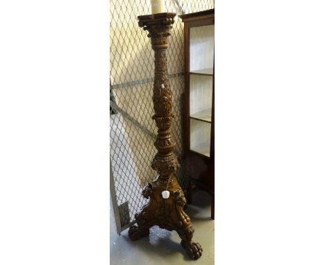 Large 19th century rococco style carved walnut torchere, later converted to a standard lamp, overall heavily relief carved wi