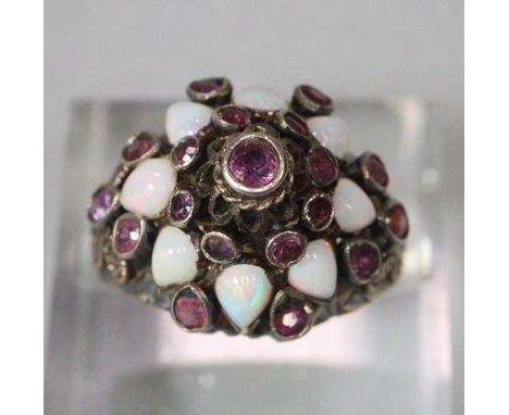 Yellow metal opal and red stone cluster ring.  4.3g approx.  Size K.  (B.P. 21% + VAT) 