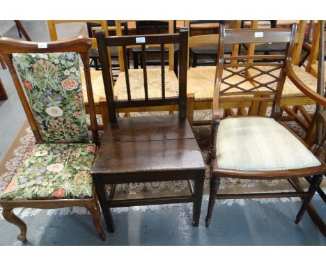 19th century oak stick back farmhouse kitchen chair together with an Edwardian mahogany inlaid lattice back open armchair and