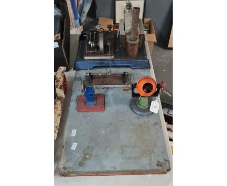 Stationary steam engine with various accessories driven by pullies, including: cement mixer etc.  (B.P. 21% + VAT) 
