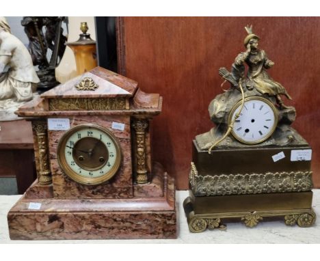 Late 19th century pink veined marble architectural two train mantle clock with gilt metal mounts and French brass drum moveme